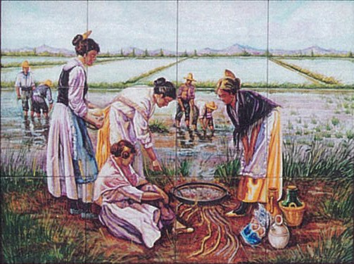 Azuleros célèbres de Valencianas cuisinant une Paella dans la Albufera Azuleros célèbres de Valencianas cuisinant une Paella dans la Albufera